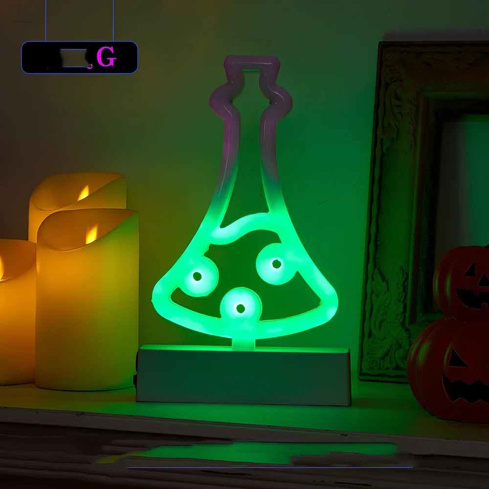Set of nine glowing Halloween pumpkin lanterns in varying sizes from 14.5cm to 23cm height with plastic construction