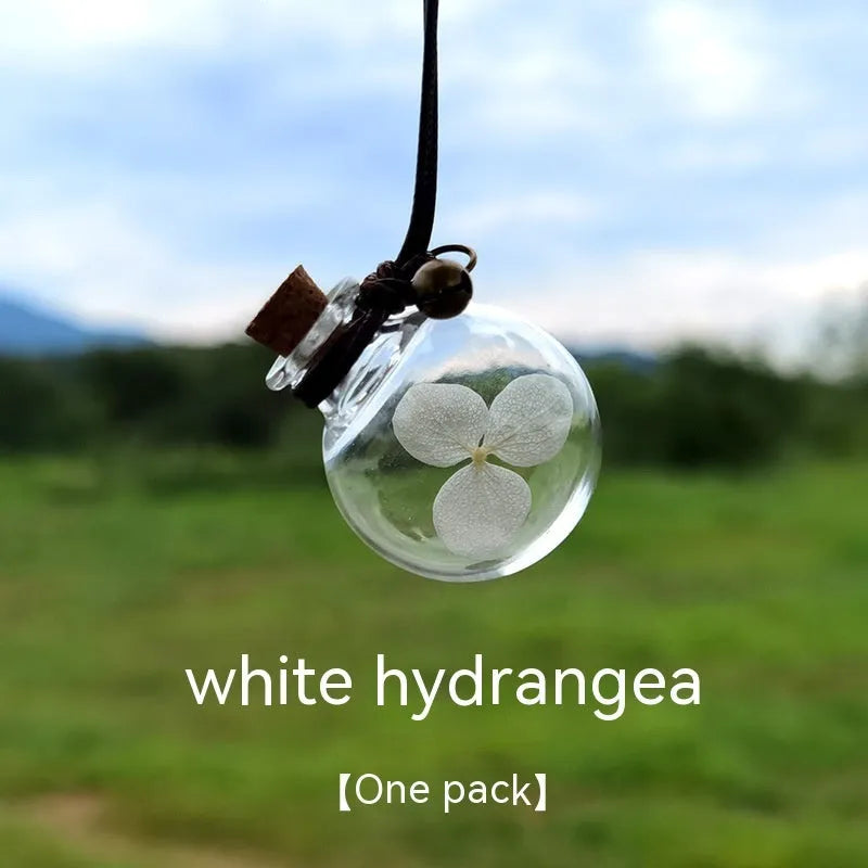 Glass fire extinguisher-shaped car perfume pendant with preserved flowers inside