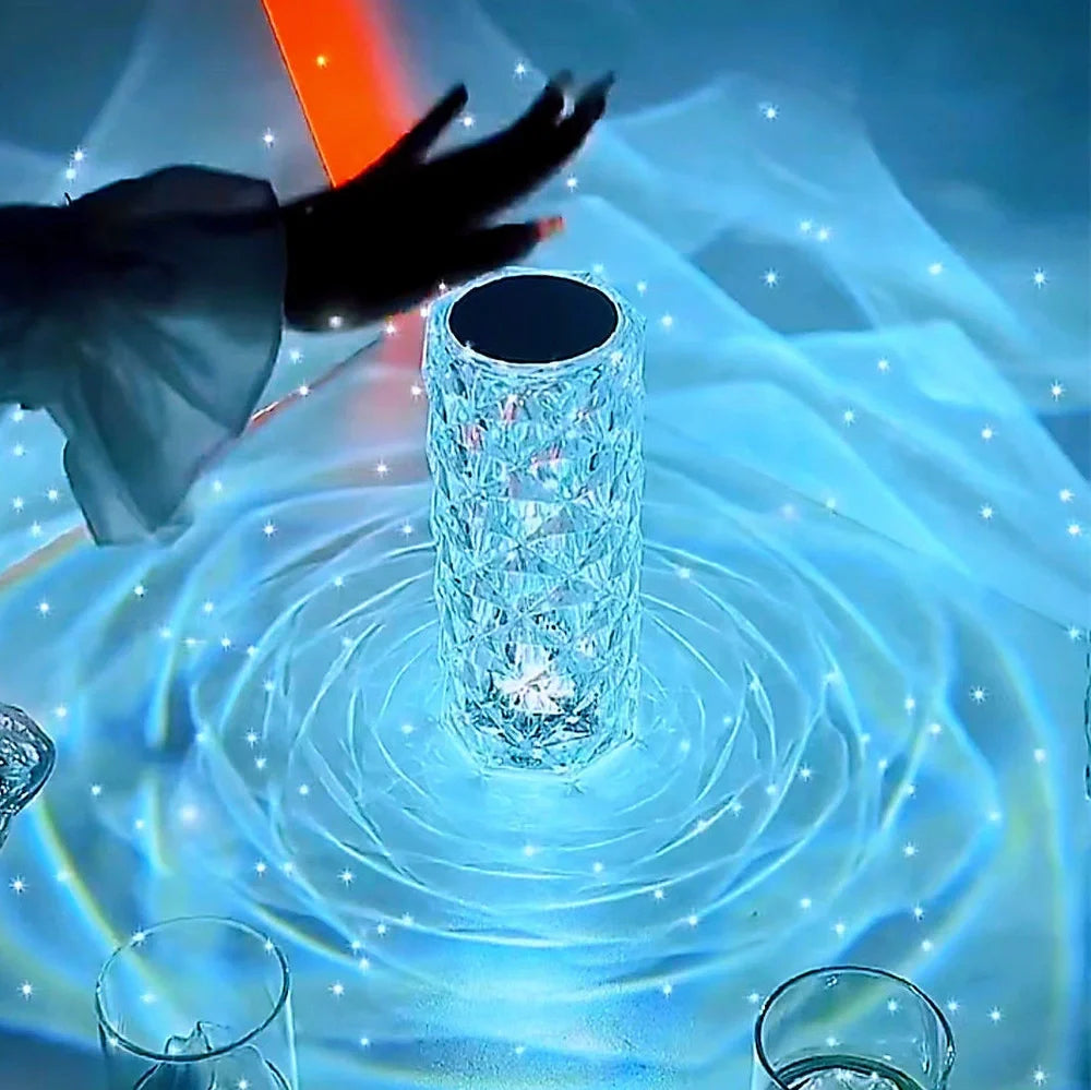 LED crystal table lamp showing 16 colour options with touch controls and remote, measuring 15.8cm high