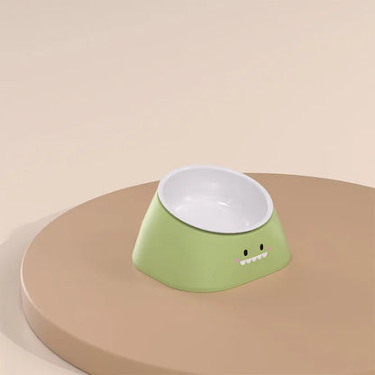 Green tilted stainless steel pet bowl with a 15-degree angle on a white background.