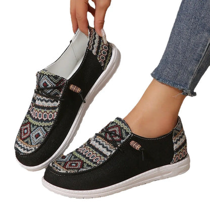 Women's black round toe flat shoes with low-top design and elasticated oversleeves