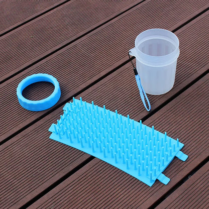 Blue silicone and PP portable dog foot wash barrel for cleaning pet paws.