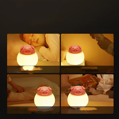 Pink silicone pig-shaped bedside lamp with adjustable lighting on wooden table