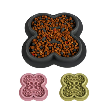 Silicone pet licking mat in green with textured surface and suction cups on base