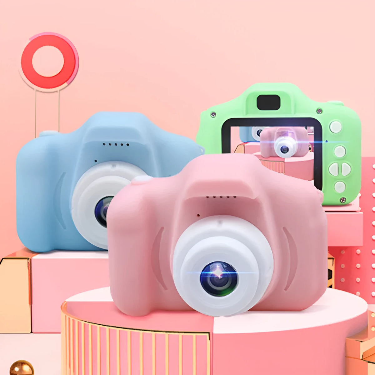 Colourful kids digital camera with silicone case showing 2-inch screen and lens.