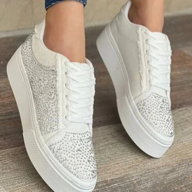 Plus size women's black lace-up casual shoes with rhinestone detail on round toe and thick rubber sole.