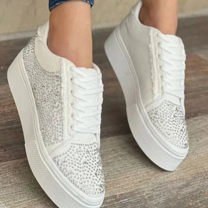 Plus size women's black lace-up casual shoes with rhinestone detail on round toe and thick rubber sole.