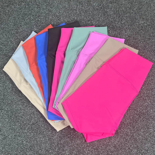 High-waisted yoga shorts in nylon fabric for moisture-wicking during sports, available in multiple colours and sizes.