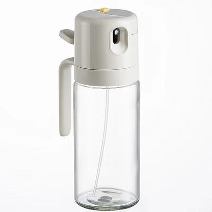Versatile oil sprayer and pourer made of sturdy soda-lime glass, with automatic opening and closing mechanism for one-handed operation and dual spraying and pouring functions