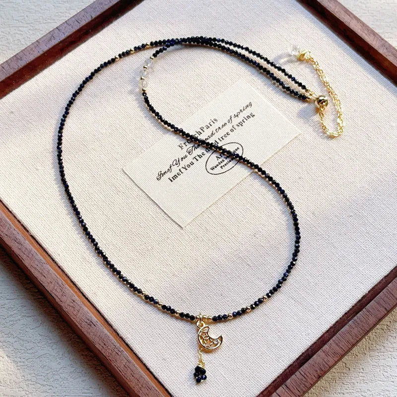 Blue gold sand stone cut three-ring multi-layer bracelet for women on a wrist.