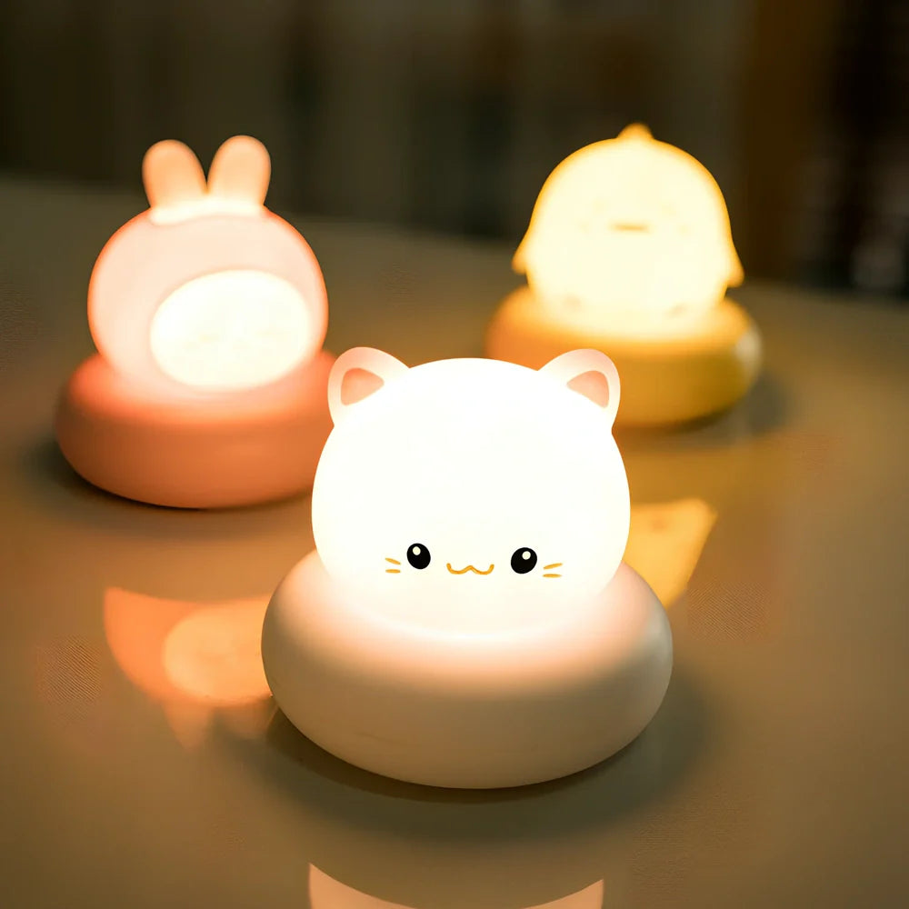 Tap-activated LED desk lamp with animal design measuring 83mm square