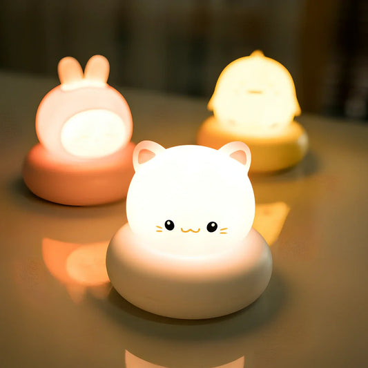 Tap-activated LED desk lamp with animal design measuring 83mm square