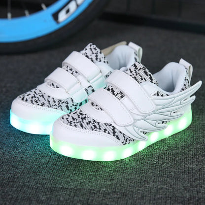 Children's LED light-up sneakers with USB charging port, available in plum red and white colours