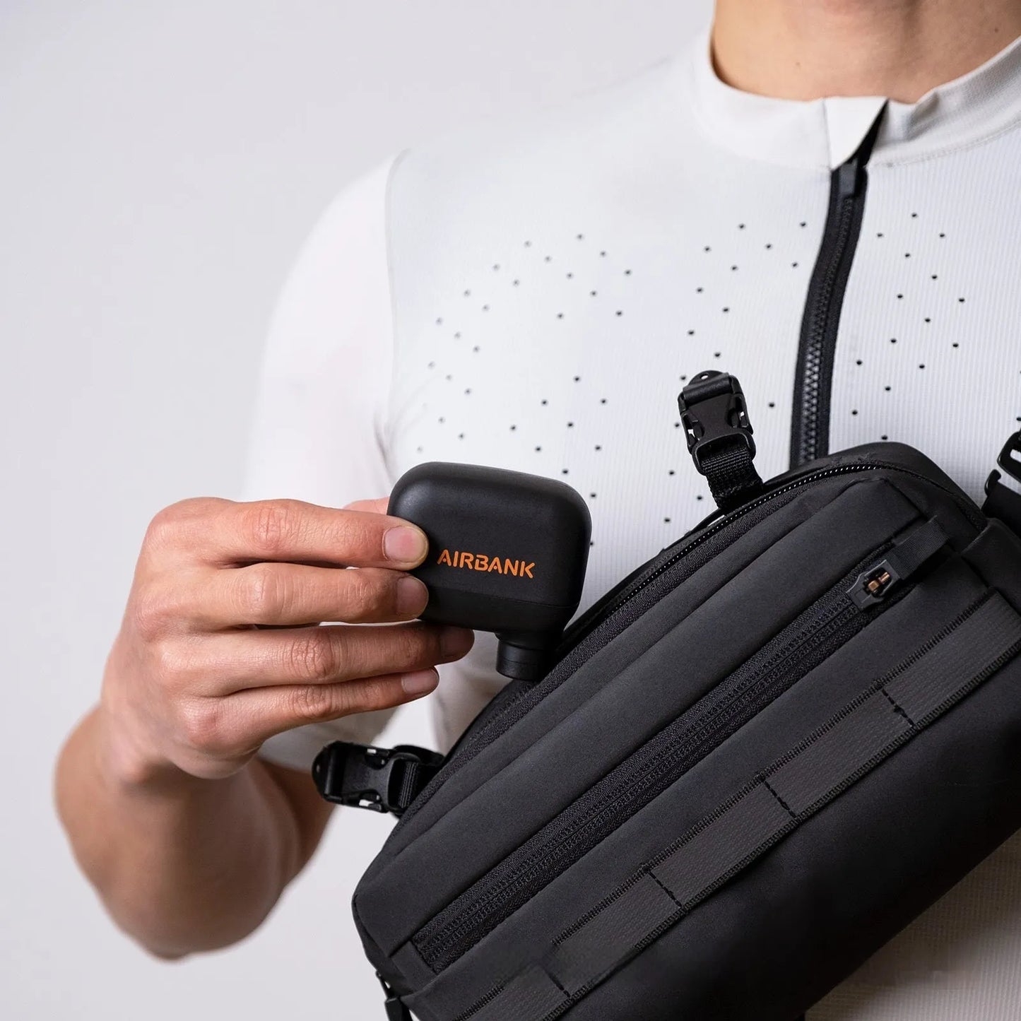 Black AS100 portable electric bike tyre inflator with USB cable and waterproof bag