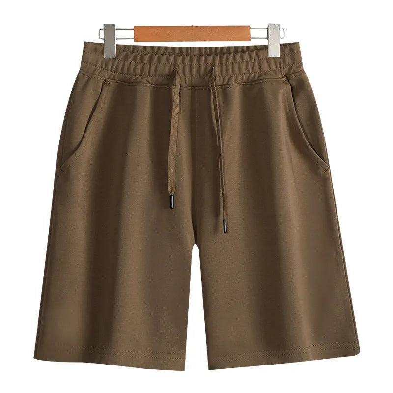 Men's straight-leg cotton casual shorts in light grey on a plain background.