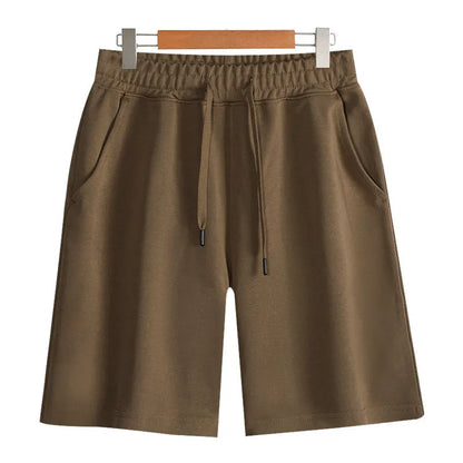 Men's straight-leg cotton casual shorts in light grey on a plain background.