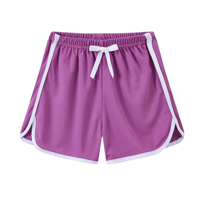 Children's polyester beach shorts in multiple colours and patterns, including leopard print and stripes, shown on size chart.