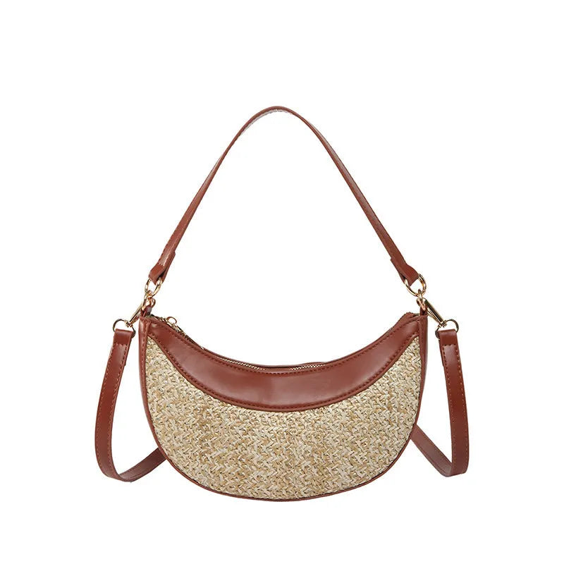 Women's hard-shell straw shoulder bag in a dumpling shape with a crossbody strap, shown in a choice of colours.
