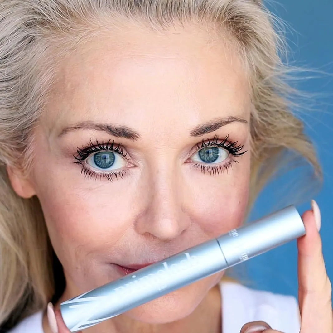 Black dual-ended eyelash brush and comb beauty tool with separate brush and comb ends