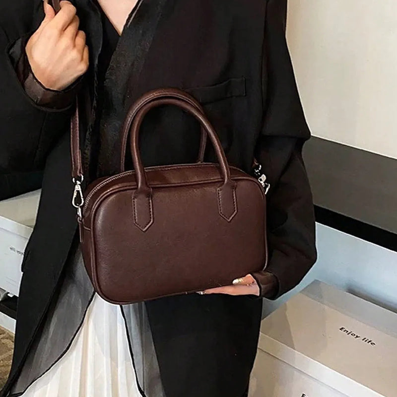 Retro messenger bag PU leather horizontal square unisex simple small crossbody single shoulder strap for everyday use in black or coffee colour