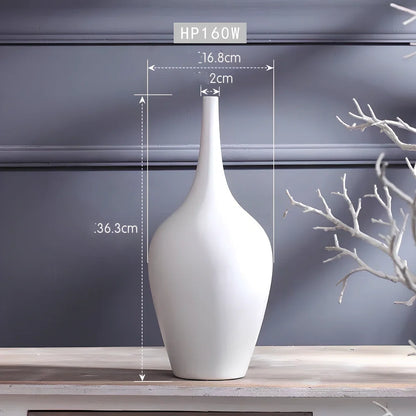 White ceramic tall vase with matte finish measuring 160mm height for flower arrangements