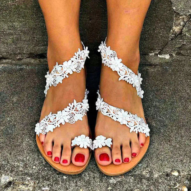 Rhinestone and flower embellished women's flat shoes in plus sizes, featuring a low-cut back design and breathable PU upper for casual wear, available in UK sizes 2 to 9.