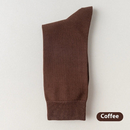 Mid-calf business socks in solid colours with combed cotton construction and deodorant function