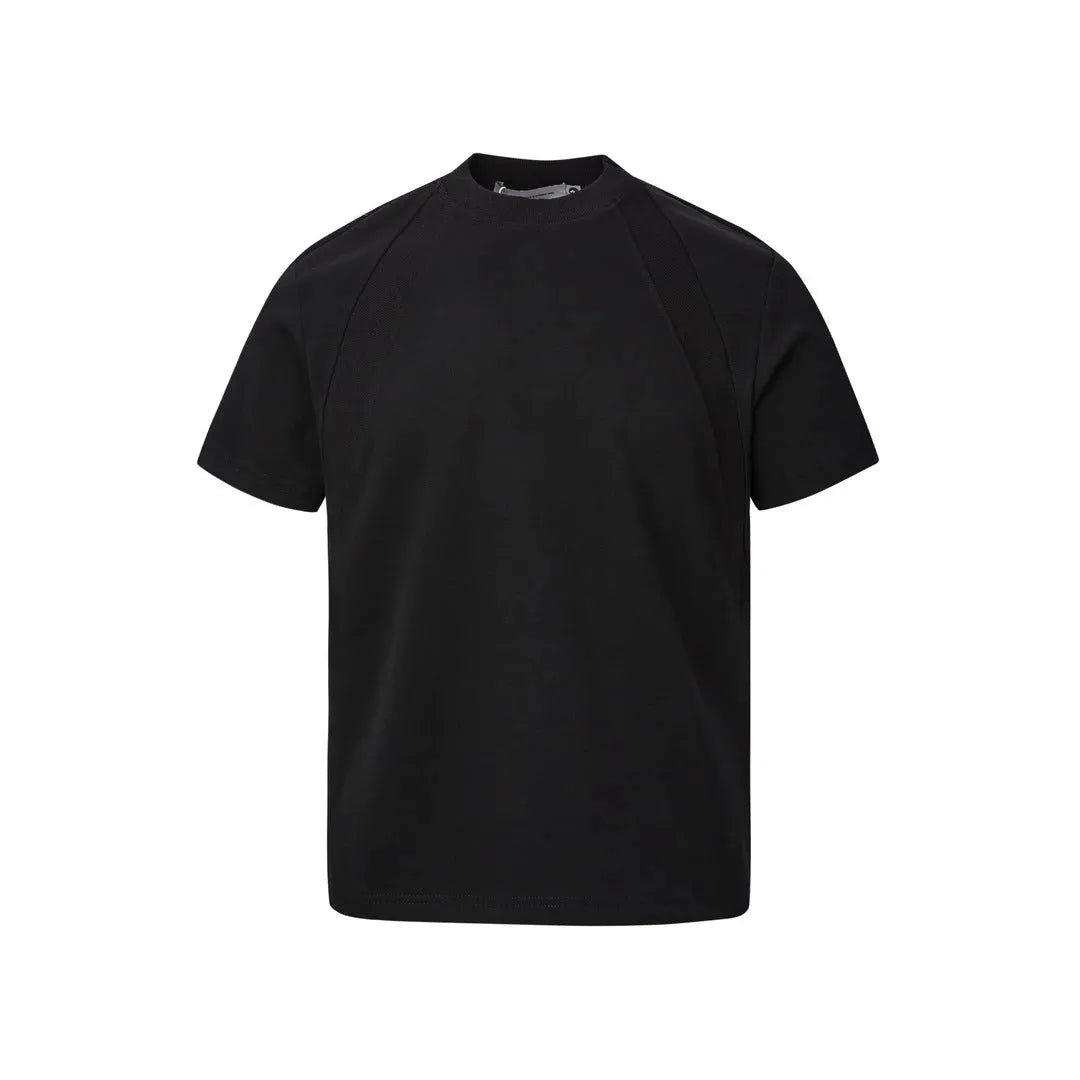 Man's loose fit black short sleeve top with textured air layer stitching detail.