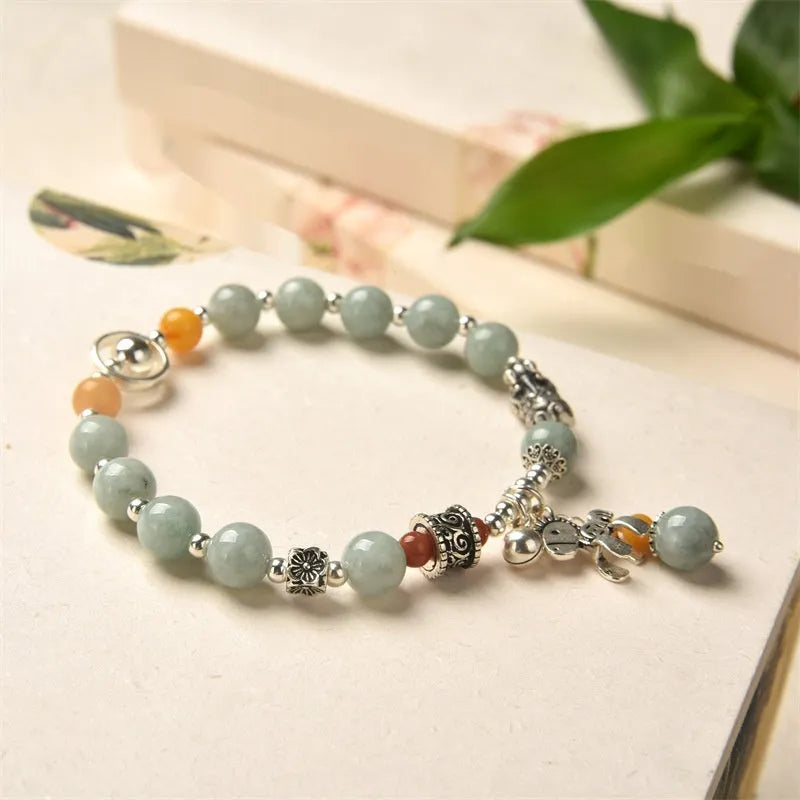 Natural jade and alloy vintage bracelet with retro style and pony bracelet design