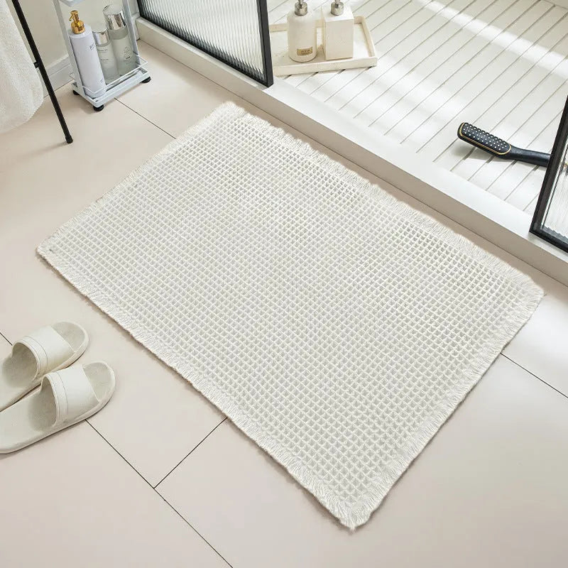 Checkered pattern non-slip bathroom carpet in beige colour with woven polyester construction