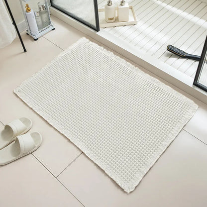 Checkered pattern non-slip bathroom carpet in beige colour with woven polyester construction