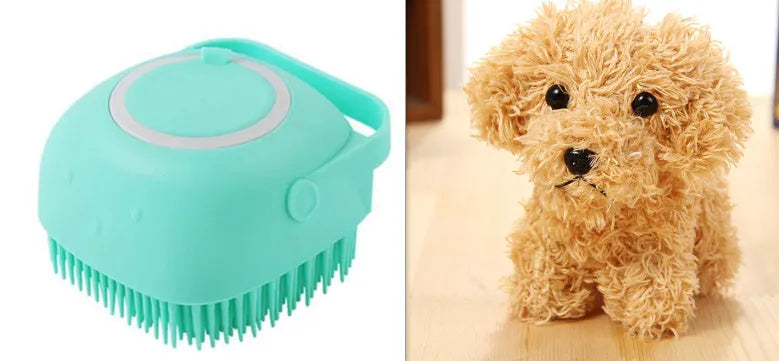Blue silicone dog bath and massage brush held in a hand.