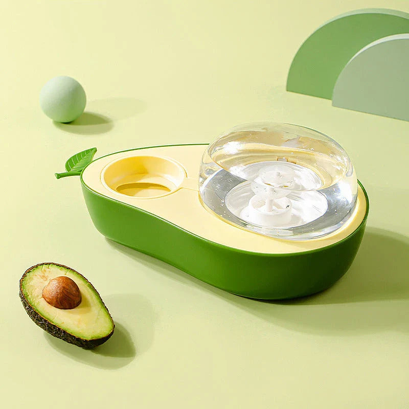 Avocado-shaped automatic pet feeder and water dispenser for dogs and cats, featuring slow-feed bowl, adjustable water flow, and durable construction
