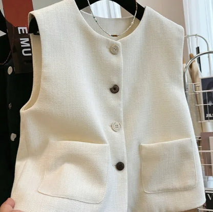 Women's round-neck sleeveless bandage vest in milky white, shown on a model.