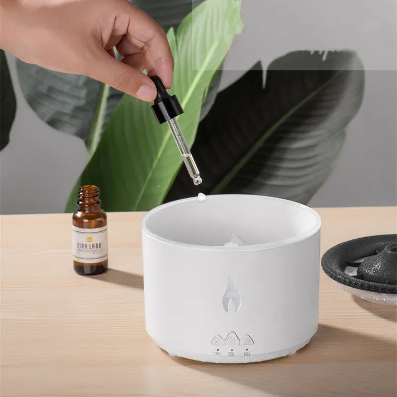 Colourful volcano-shaped cool mist humidifier with aromatherapy tray and flame-effect night light.