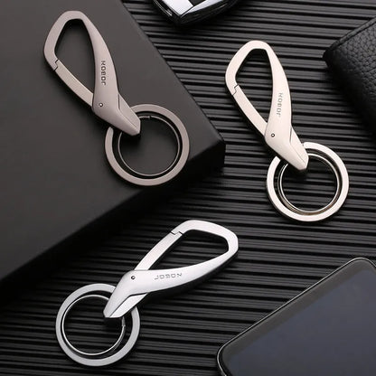 Zinc alloy double ring key chain measuring 8.3x3.5cm with black finish and modern simplicity design