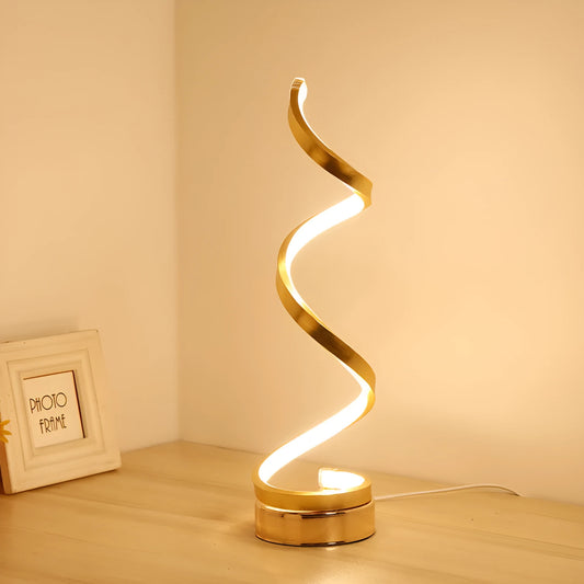 Black and white minimalist LED bedside lamp with aluminium shade and tri-colour dimming on a table