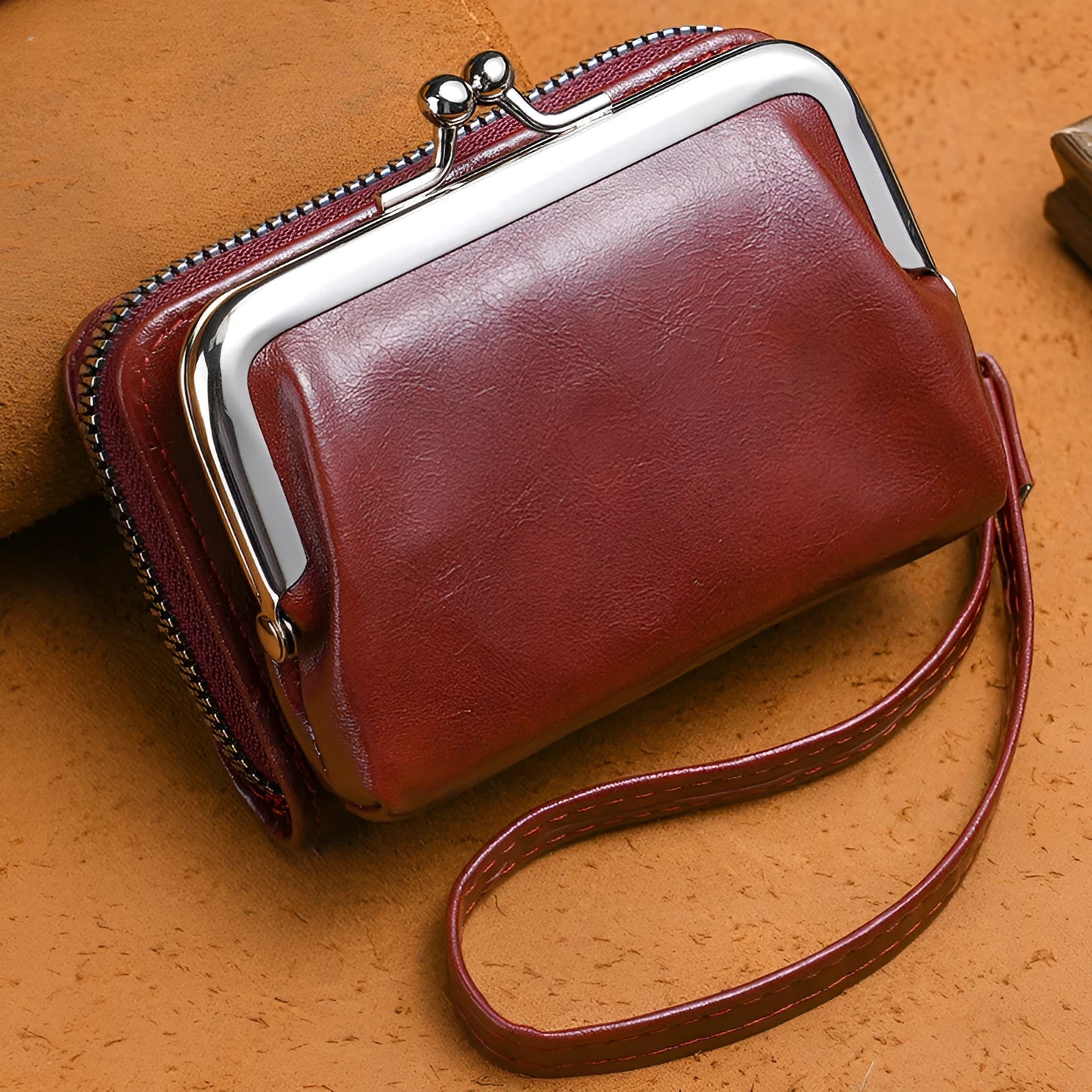 Ladies buckle-fastening coin purse with a 4-inch metal clip and zip, shown in multiple colour options.