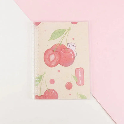 Hard cover A5 and B5 notebook with animal painting designs like whales and fruit, showing coil binding.