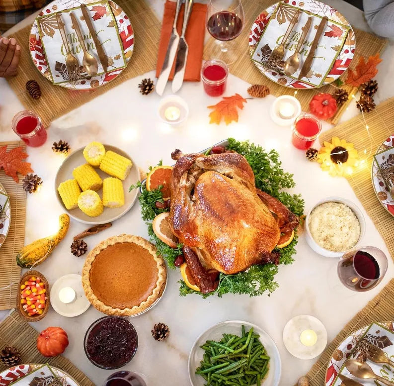 Red Thanksgiving plates and napkins set for holiday table settings