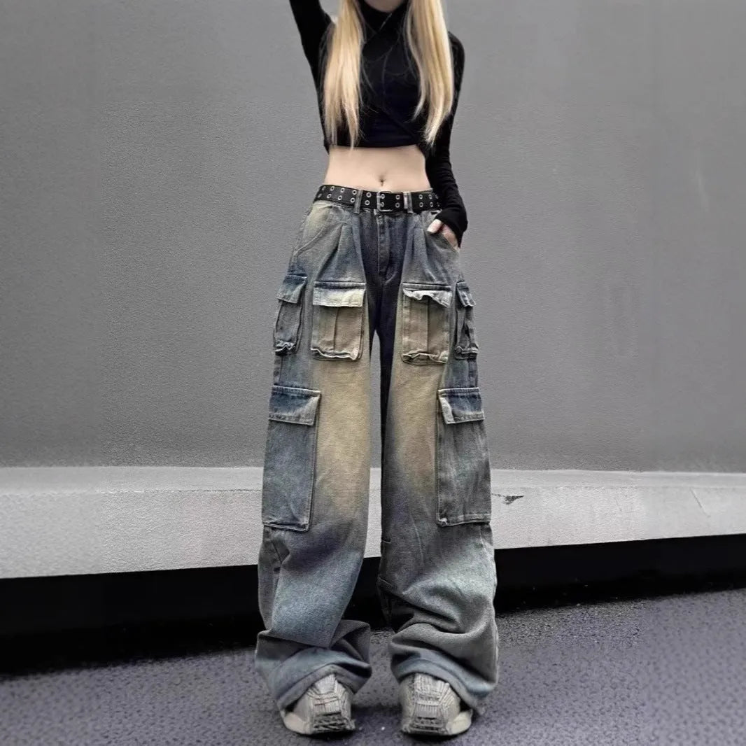 Loose multi-pocket distressed denim pants in light blue and black on a size chart.