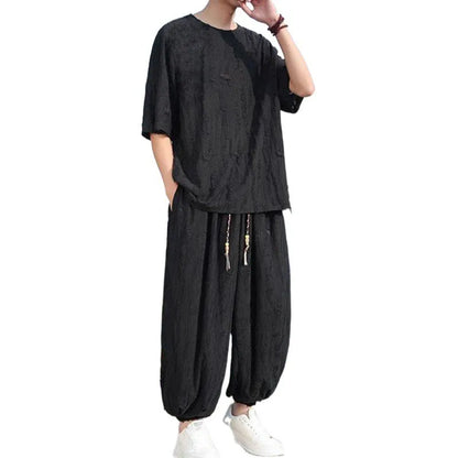Men's black and grey knitted short-sleeve top with matching loose cropped trousers casual suit set