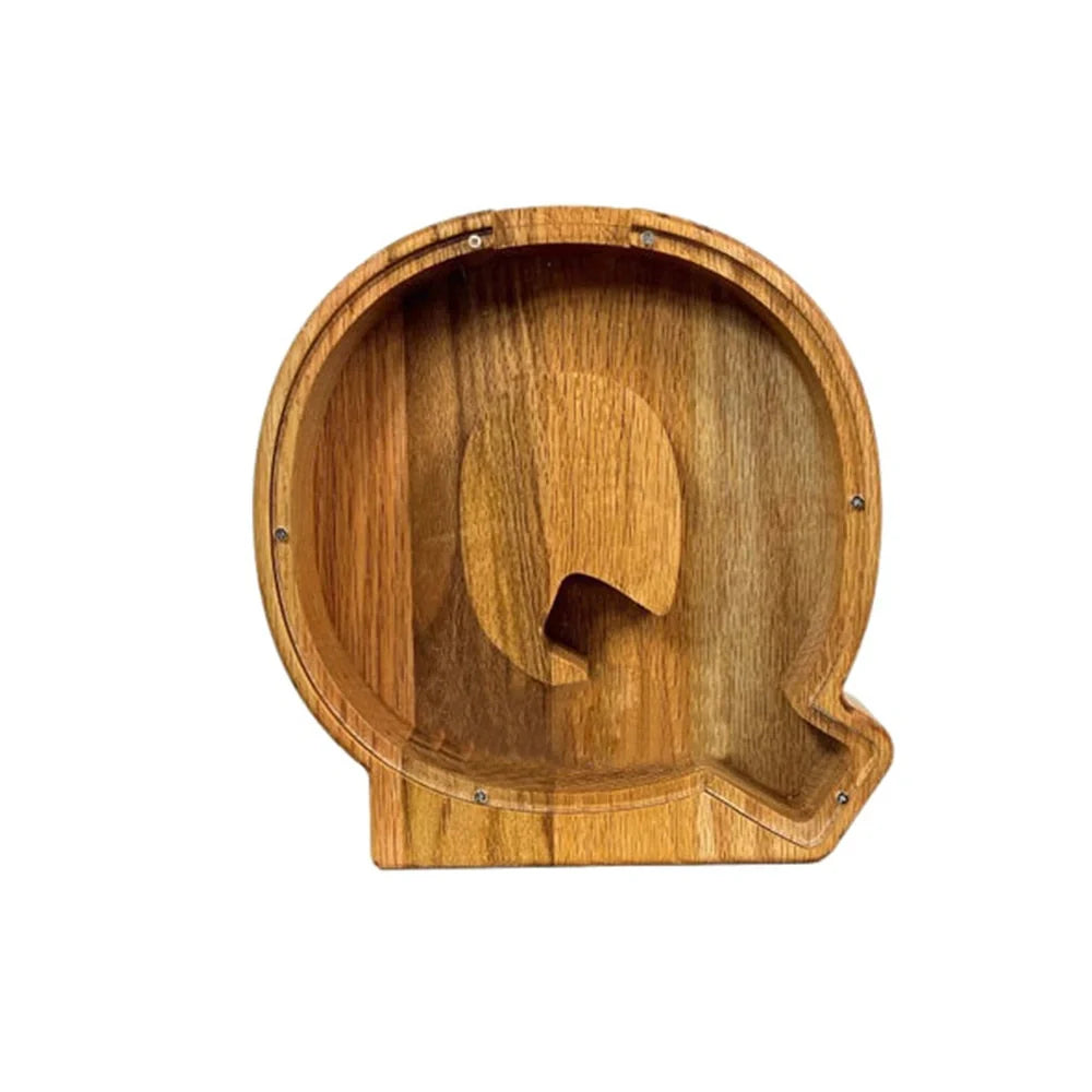 Handmade wooden letter piggy bank with personalised initial, showing 15cm height and 5cm coin slot for UK coins