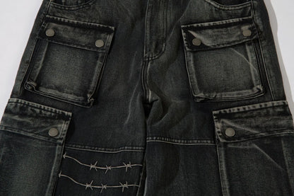 Men's black wide-leg cotton trousers with embroidery details on mid waist design