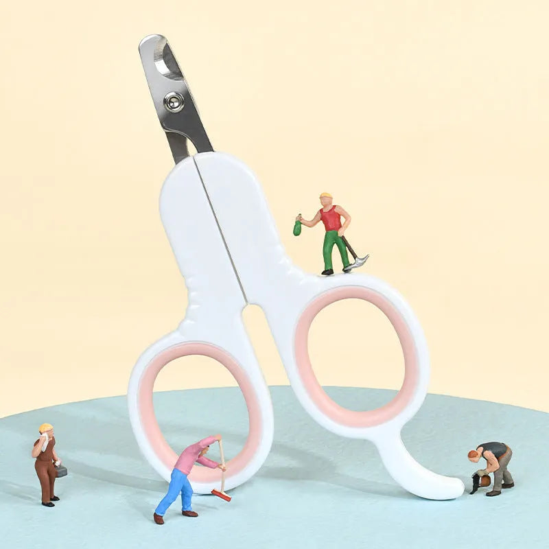 Professional grey pet nail clippers with curved safety tips and a rubberised ergonomic handle on a white background.