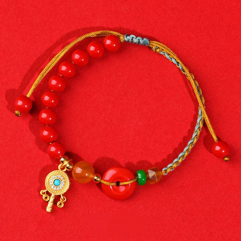 Hand-woven cinnabar peace blessing bracelet in emperor red sand with national style geometry design