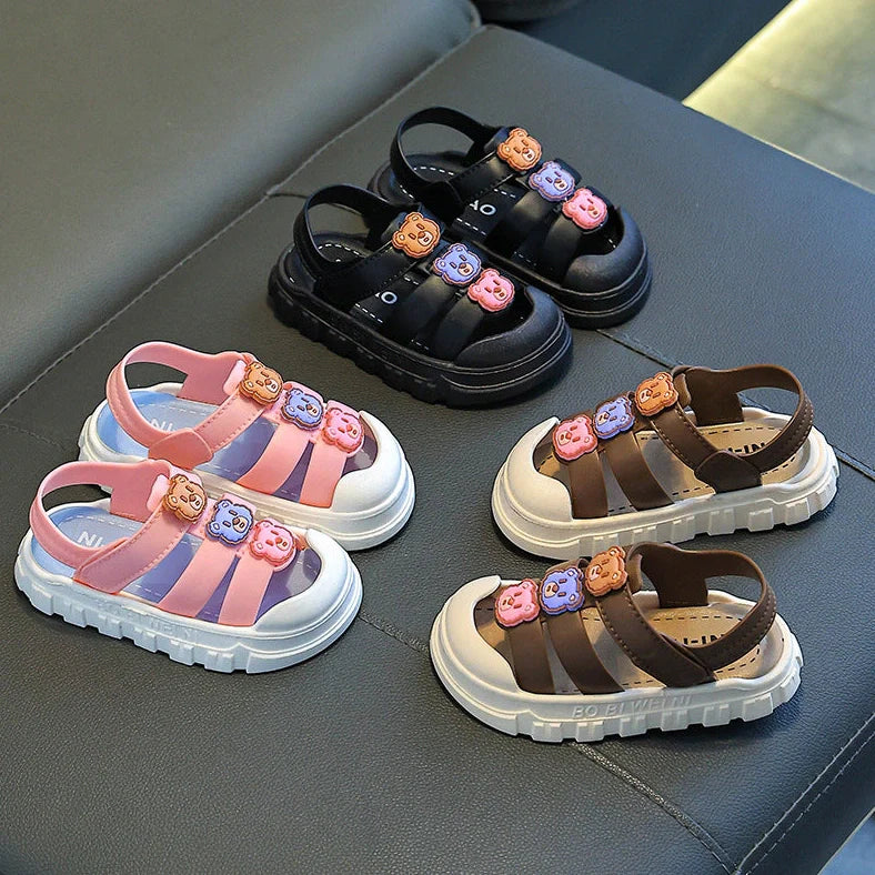 Boy's cartoon pattern baby shoes with non-slip PVC soles and Velcro fastening in black colour