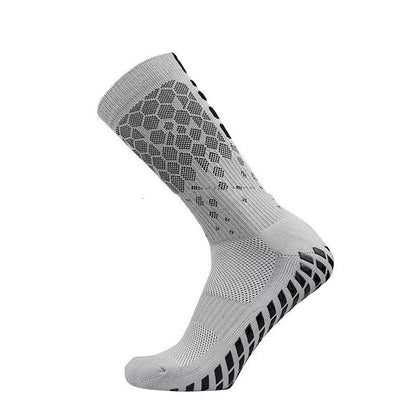 Non-slip soccer socks in various colors, designed for competition and training