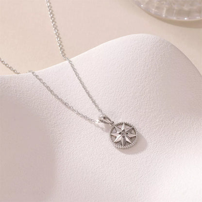 Lucky Compass Necklace with star-shaped titanium steel pendant in gold and white gold