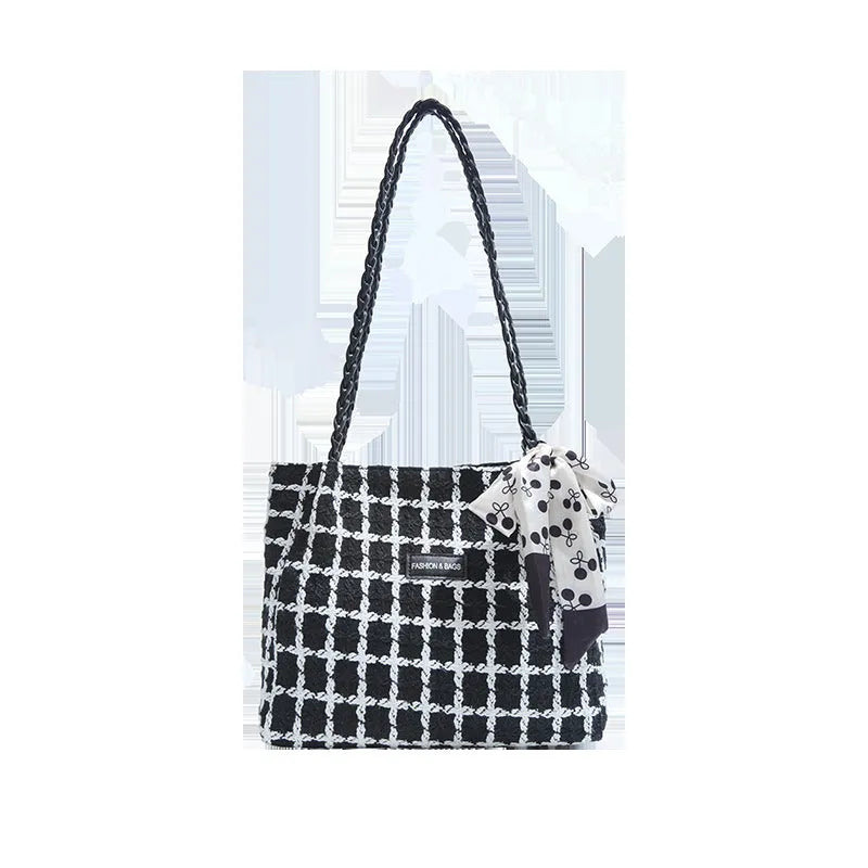 Horizontal square wool shoulder bag in black with sandwich pocket and internal organisation compartments